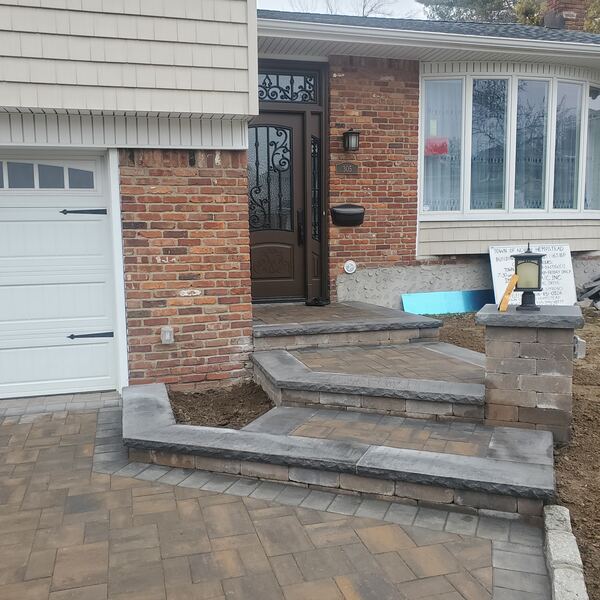 Premium paver driveway with soldier course border