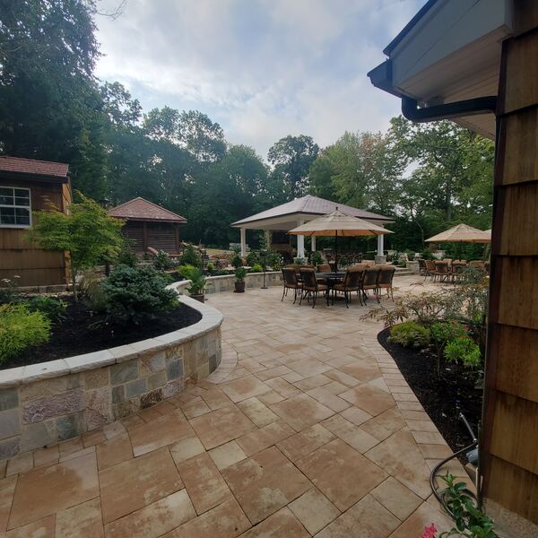 Custom patio design with decorative inlay pattern