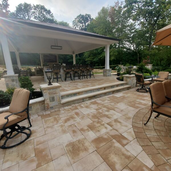 Paver patio with natural stone accents