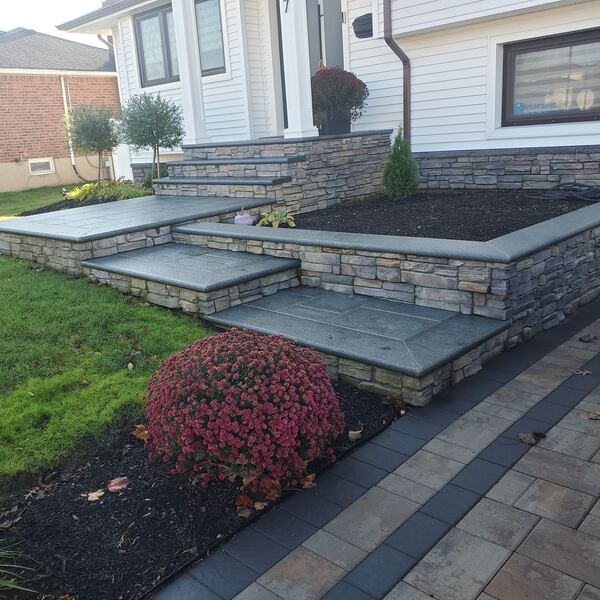 Front entry walkway with decorative border detail