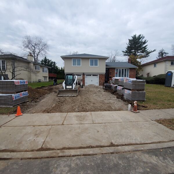 Formal front walkway with pillared entrance